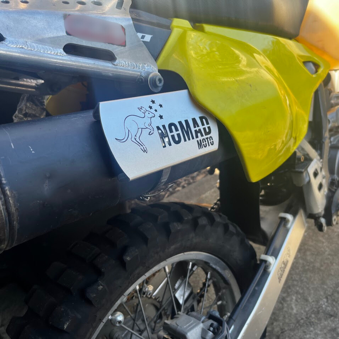 NOMAD MOTO exhaust heat shield on bike