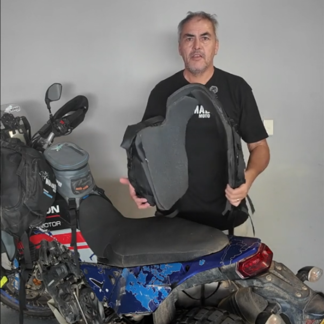 Founder Nomad Moto holding 16L Rackeless System 